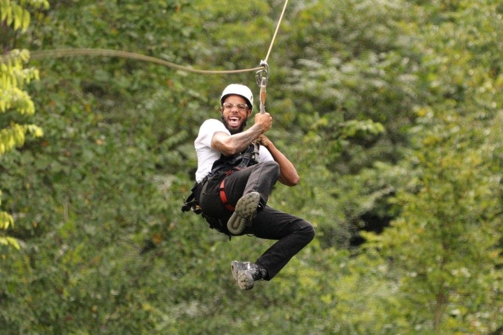 Wahoo Ziplines adventure in the Smoky Mountains, showcasing breathtaking views and ziplining action, Pigeon Forge and Gatlinburg Zipline